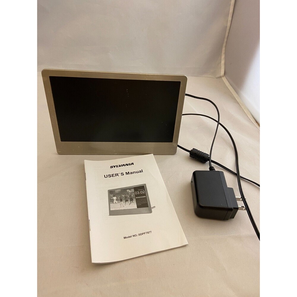 #5766 Sylvania 7 inch digital photo album clock calendar
